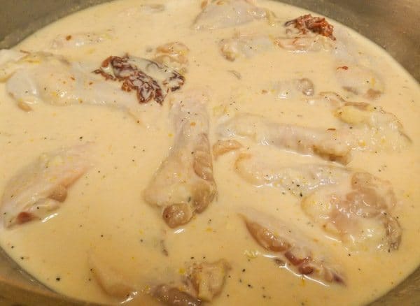 Marinating chicken wings in the chipotle buttermilk blend-Oven Fried Chicken Wings in Chipotle Sauce