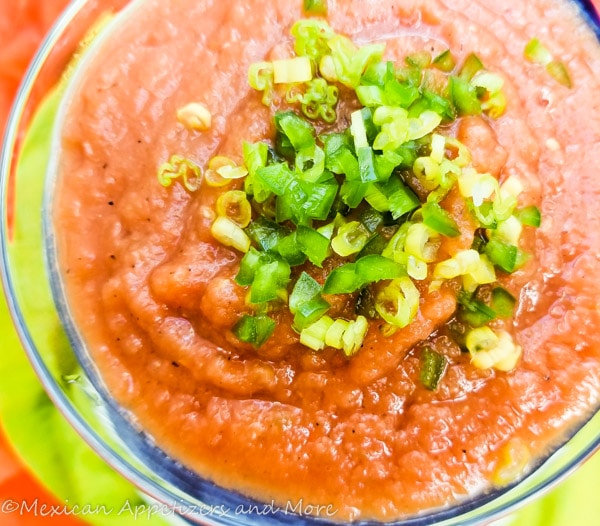 This Tomato Jalapeño Salsa is perfect for tacos, tostadas, empanadas, steak, chicken and even eggs.  Made with just 4 ingredients.  By far one of Mexico's best! Served in a Martini glass.