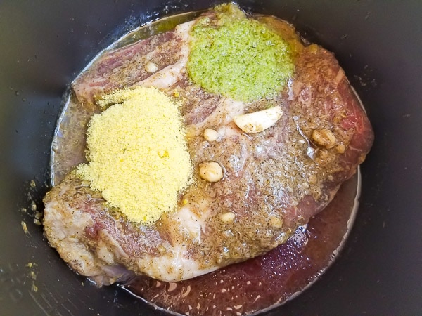 Beef roast in the instant pot marinating with all ingredients.