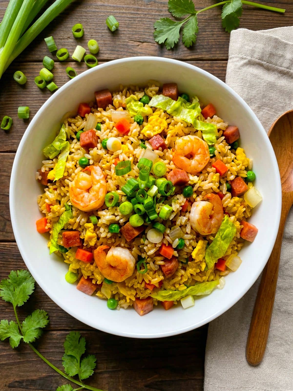 Arroz Chino Boricua served in a white bowl, topped with chopped scallions.