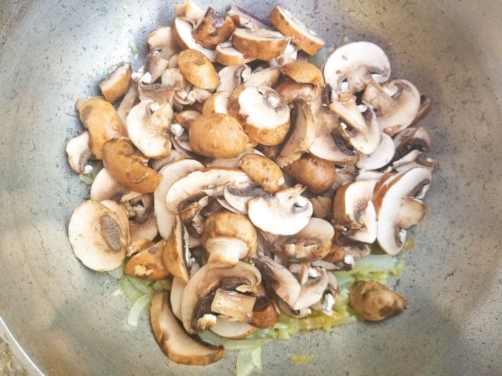 Mushrooms added to pot. 