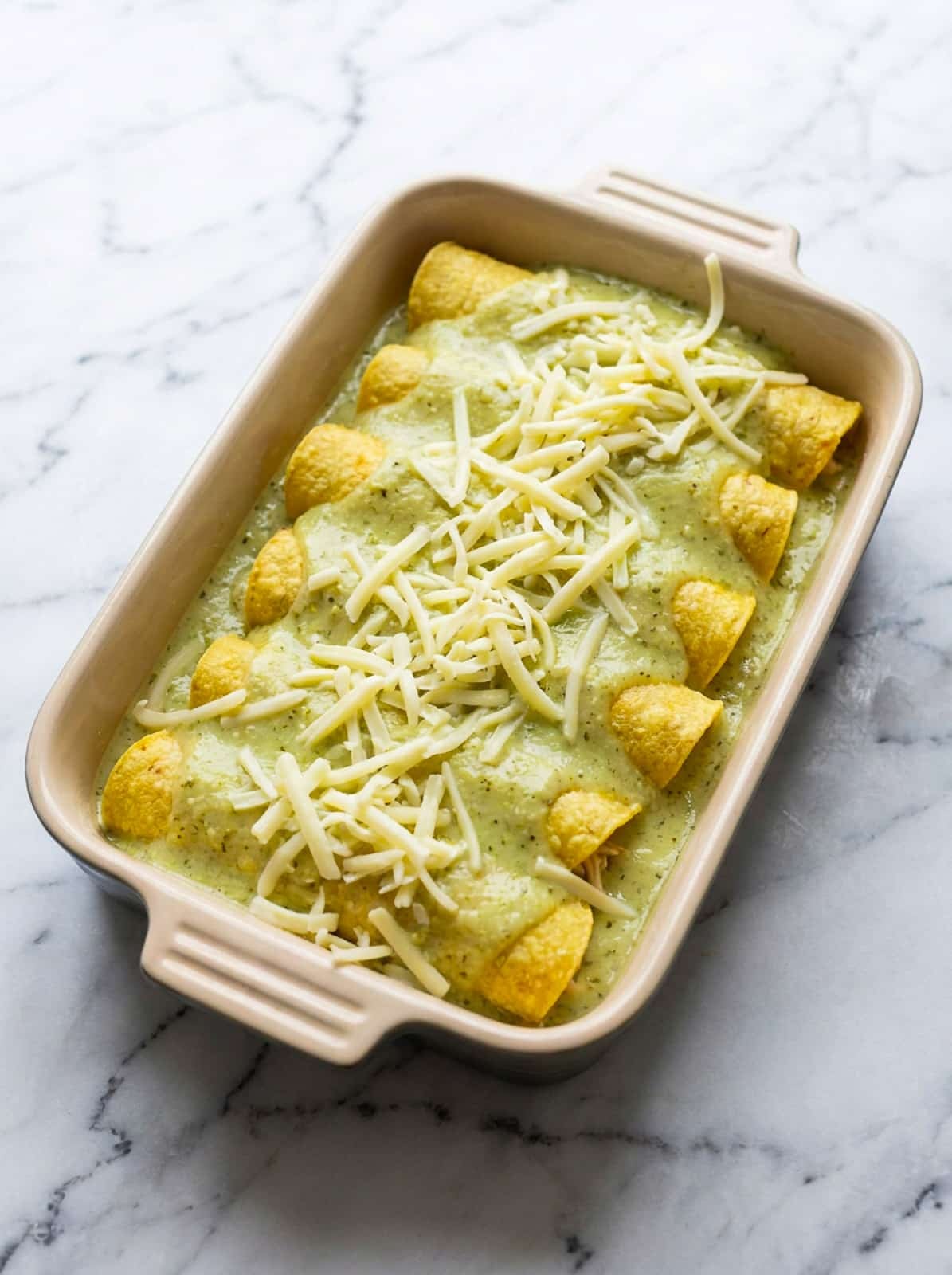 The prepared enchiladas suizas ready to bake.