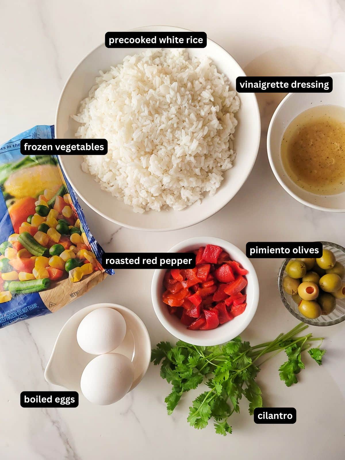 Ingredients to make ensalada de arroz primavera.