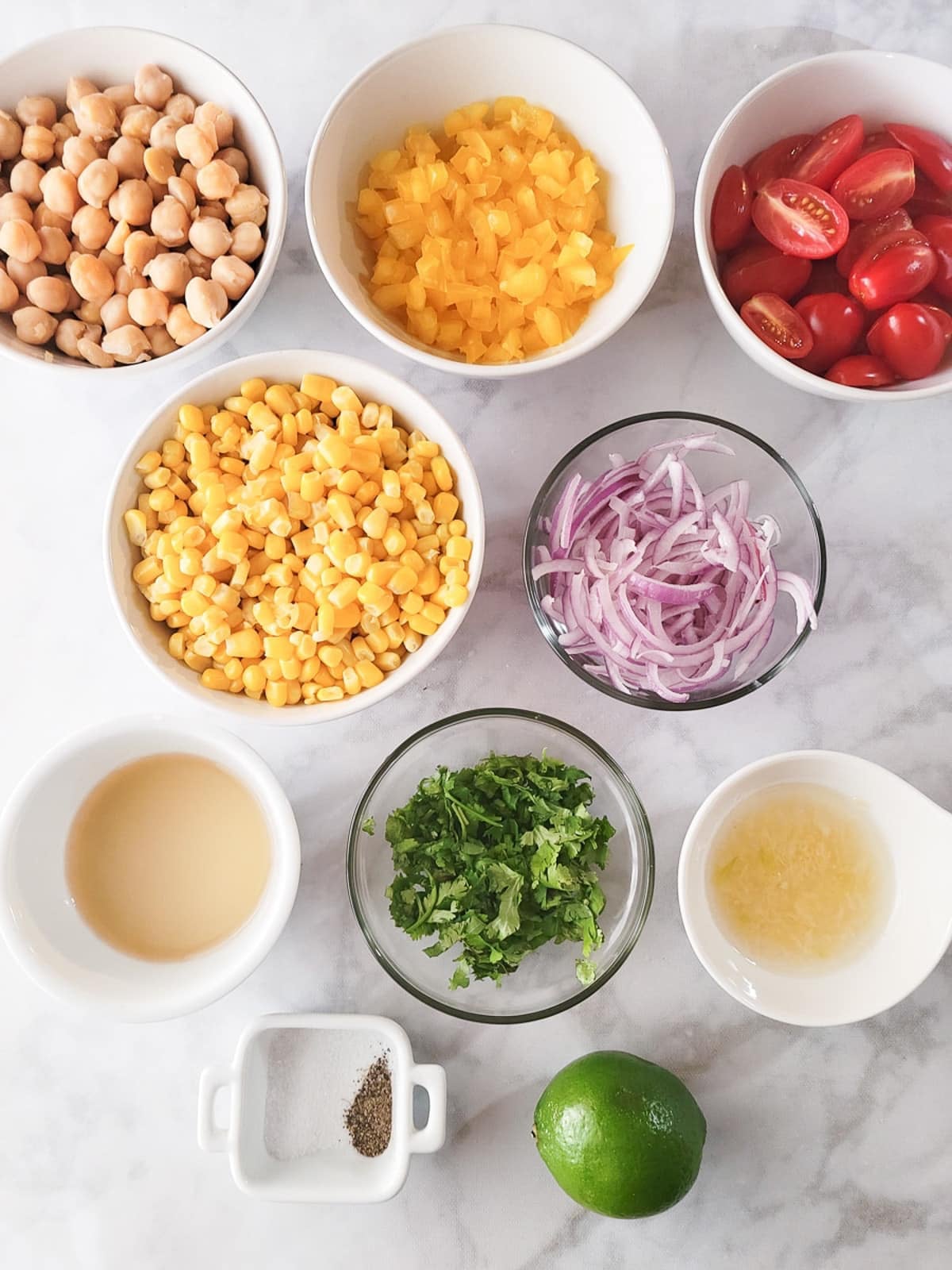 An image of the ingredients needed to make this garbanzo bean salad. 