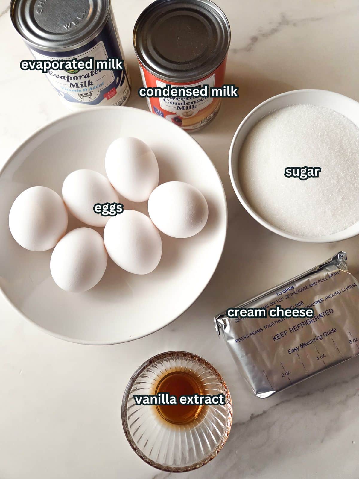 An image of all the ingredients needed to make the Puerto Rican flan de queso.