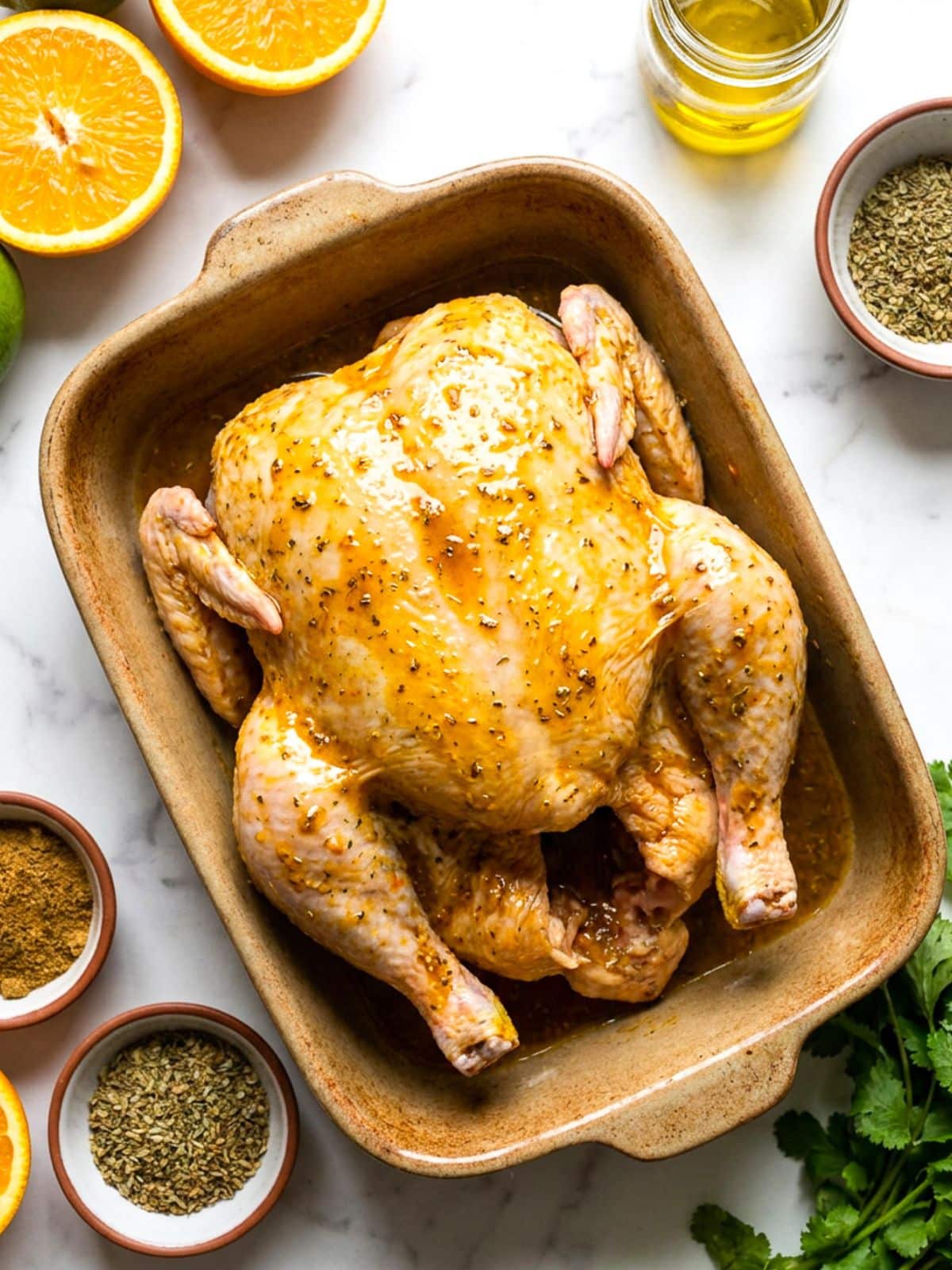 A whole chicken marinated in the Cuban pollo asado marinade.