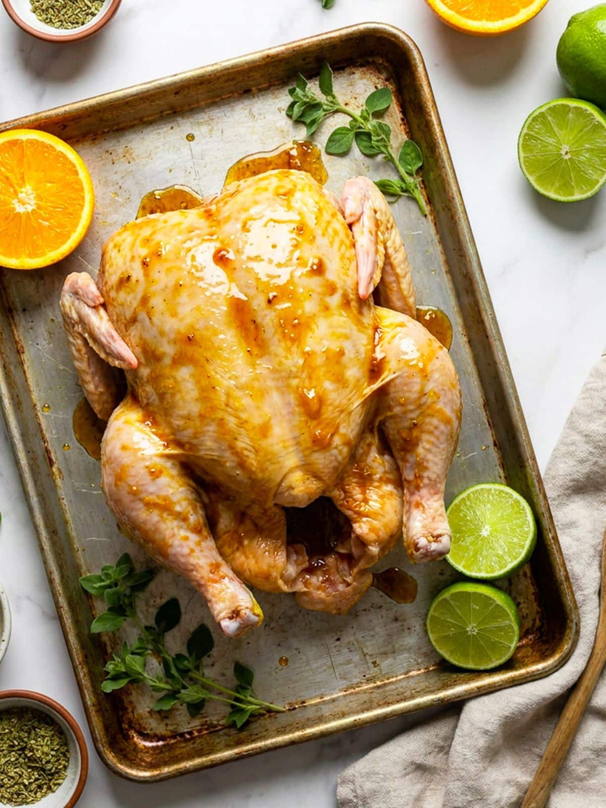 A whole chicken marinated in the Honduran pollo asado marinade.