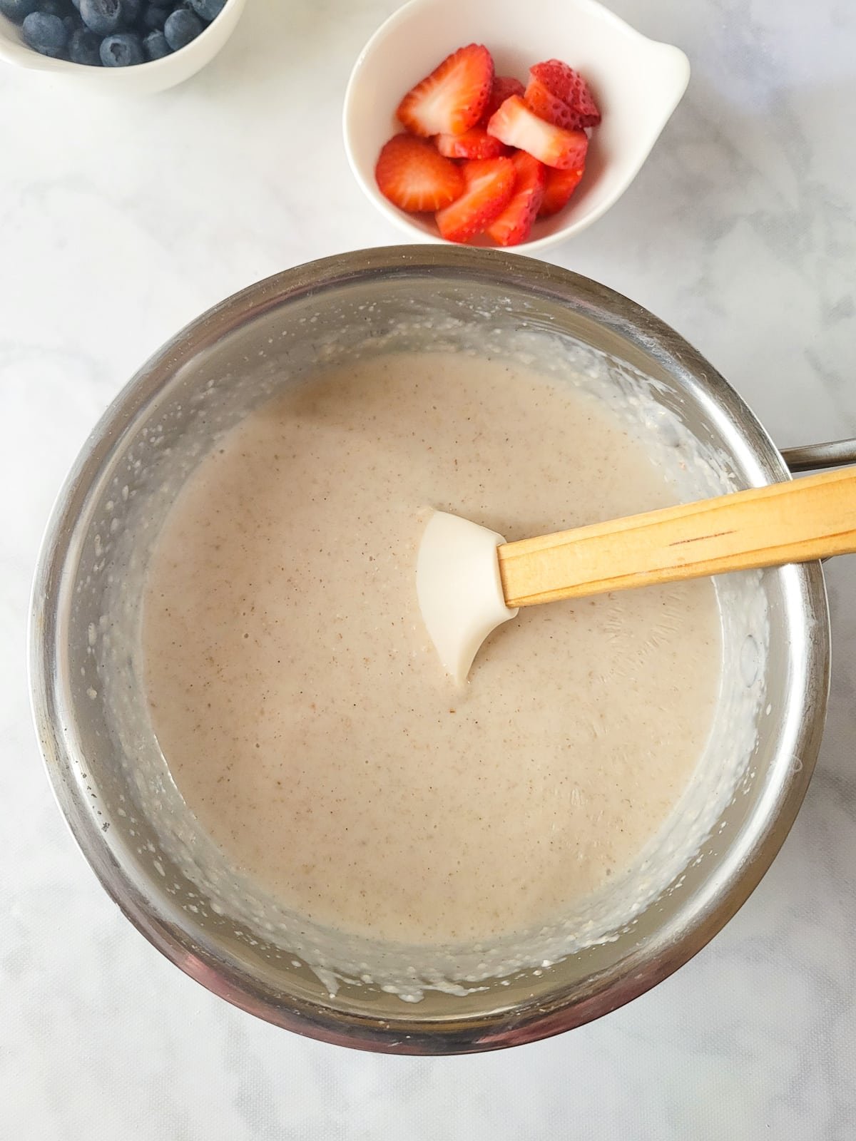 Thickening the Puerto Rican oatmeal (avena).