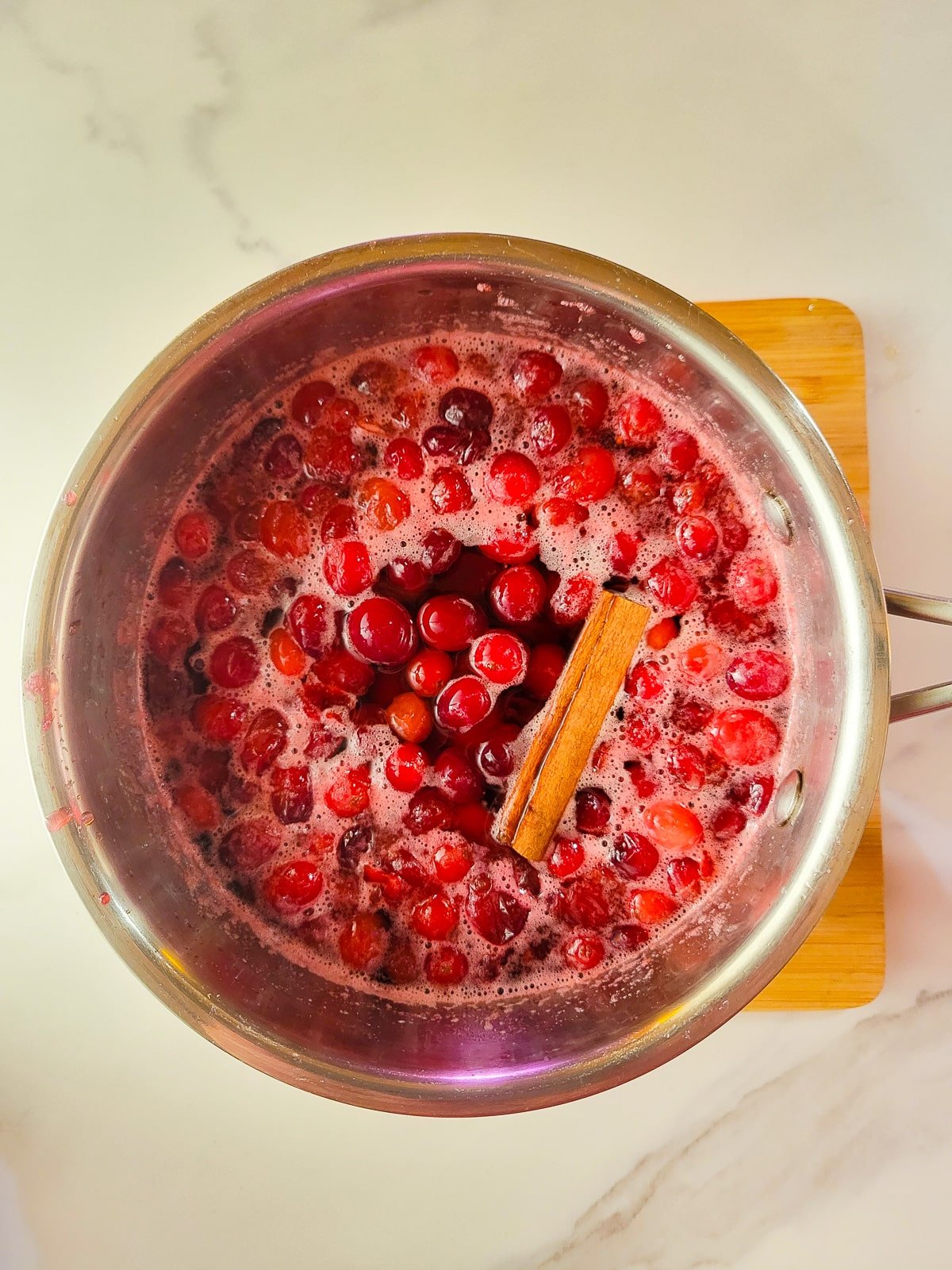 Adding the cinnamon stick in the last 5 minutes to the sauce.
