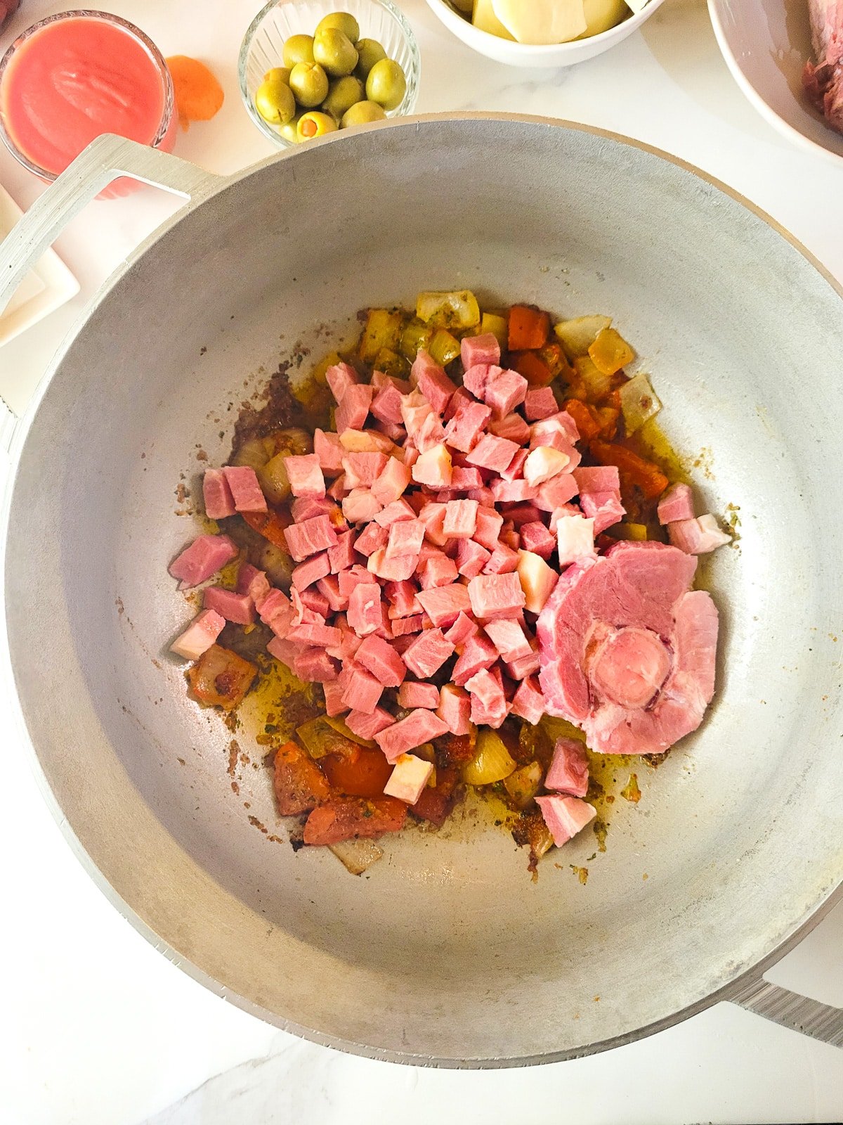 The chopped ham added to the caldero to make the sopa de jamón.