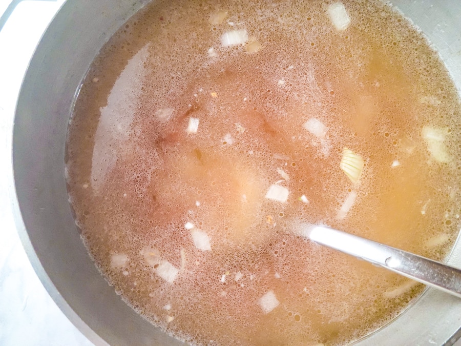 Water added to the pot for the sopa de platano.